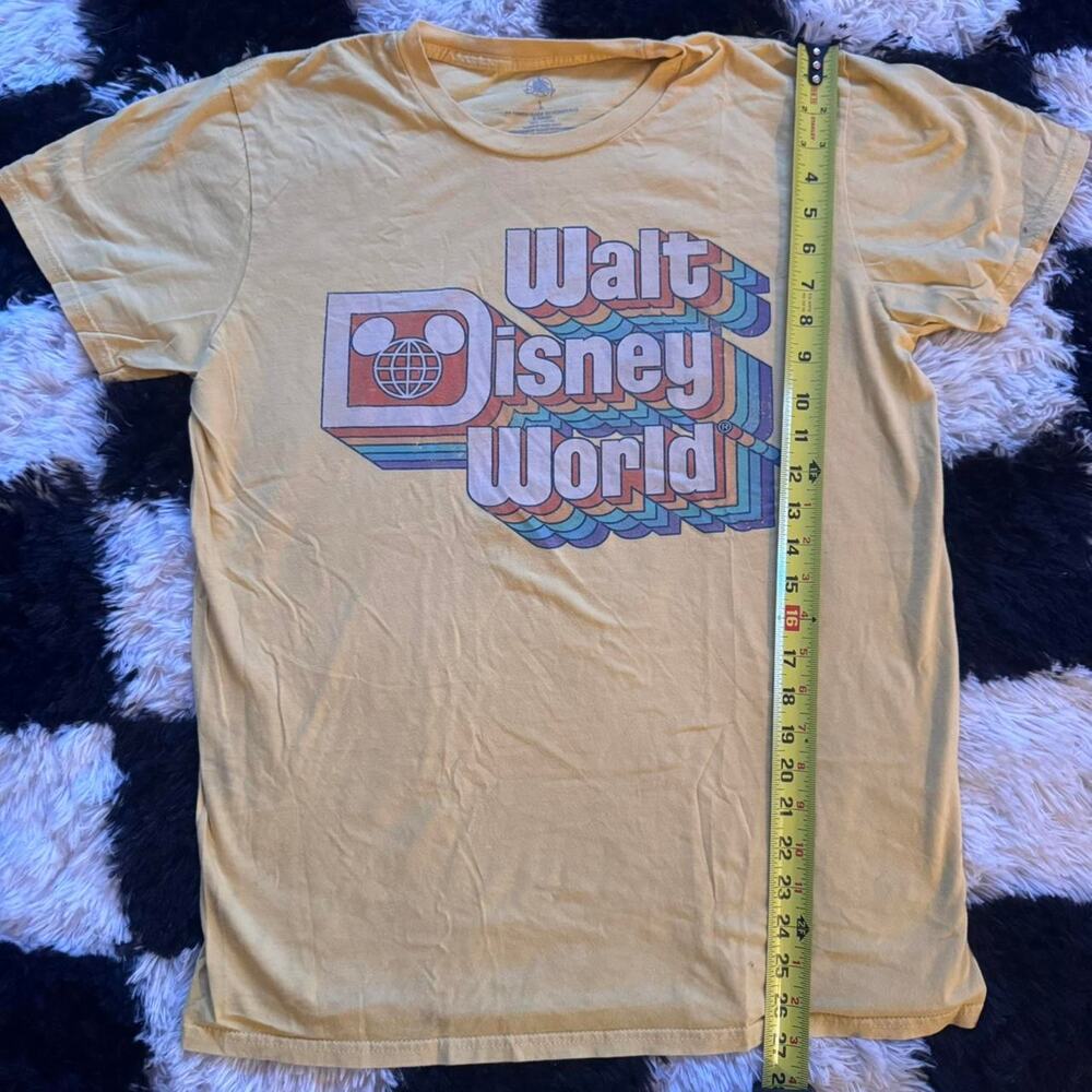 Yellow disney world graphic tee